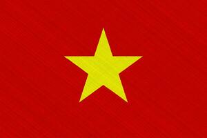 Flag of Socialist Republic of Vietnam on a textured background. Concept collage. photo