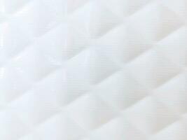 Closeup and crop bathroom white tiles pattern background and wallpaper. photo