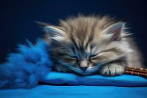 AI generated Striped kitten sleep on blue color blanket. photo