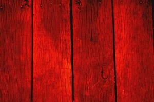 Red wood plank texture. Background old red panels. photo