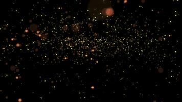 Abstract background of gold particles. Particles swirl and fly. Gold shiny background. gold dust and beautiful bokeh on a black background. seamless loop video