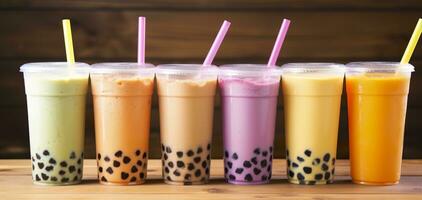 AI generated Plastic cups of different tasty bubble tea on wooden background. Generative AI photo