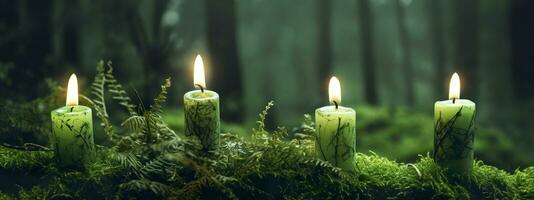 AI generated Burning candles on moss, dark green blurred the natural background. Magic candle. Generative AI photo