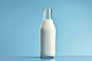 AI generated A glass bottle with full milk on blue background. AI Generated photo