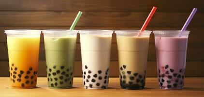 AI generated Plastic cups of different tasty bubble tea on wooden background. Generative AI photo