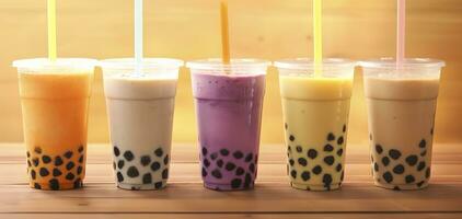 AI generated Plastic cups of different tasty bubble tea on wooden background. Generative AI photo