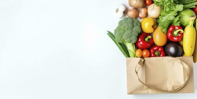 ai generado sano comida en papel bolso vegetales y frutas en blanco antecedentes. ai generado foto