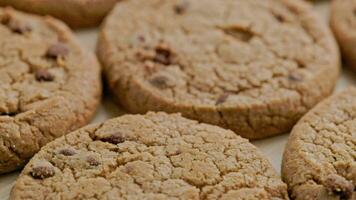 rotating round chip cake cookies with chocolate with paper label no more video