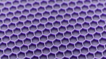 abstract purple honeycomb pattern looped spinning fullframe background video
