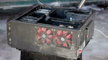 dust blowing of black atx persolnal computer case, closeup with slow motion video