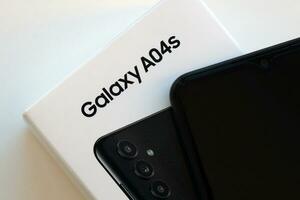 KYIV, UKRAINE - 4 MAY, 2023 Samsung Galaxy A04 Android smartphone has 6.5-inch PLS LCD panel with Infinity-V design photo