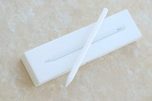KYIV, UKRAINE - 4 MAY, 2023 New Apple pencil generation 2. Features a flat edge that attaches magnetically for automatic charging and pairing photo