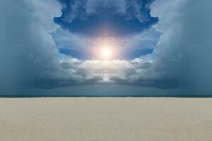 Sand and cloud sky on the beach with sun. photo