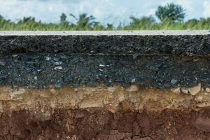 Layers of road with soil and rock. photo