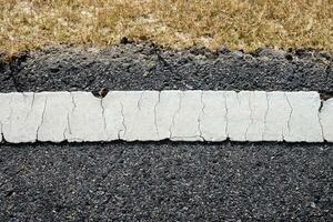 Asphalt with white road line photo