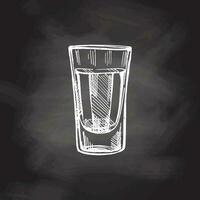 Hand-drawn shot glass with tequila on chalkboard background. Design element for the menu of bars and restaurants. Vector sketch illustration in engraving style. Mexican, Latin America.