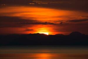 Sunset sky at the lake photo