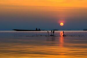 Sunset sky on the lake in south of Thailand., un-focus image. photo