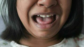 close up of child screaming at home , video