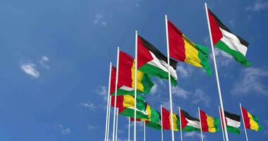 Guinea and Palestine Flags Waving Together in the Sky, Seamless Loop in Wind, Space on Left Side for Design or Information, 3D Rendering video