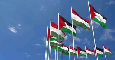 Hungary and Palestine Flags Waving Together in the Sky, Seamless Loop in Wind, Space on Left Side for Design or Information, 3D Rendering video