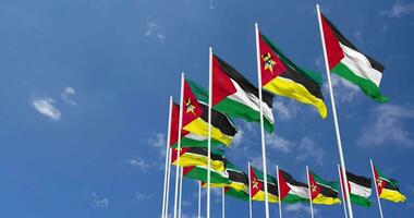 Mozambique and Palestine Flags Waving Together in the Sky, Seamless Loop in Wind, Space on Left Side for Design or Information, 3D Rendering video