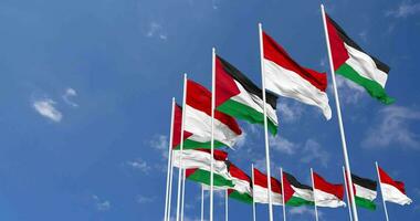 Indonesia and Palestine Flags Waving Together in the Sky, Seamless Loop in Wind, Space on Left Side for Design or Information, 3D Rendering video