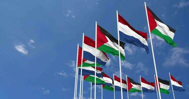 Nederland en Palestina vlaggen golvend samen in de lucht, naadloos lus in wind, ruimte Aan links kant voor ontwerp of informatie, 3d renderen video