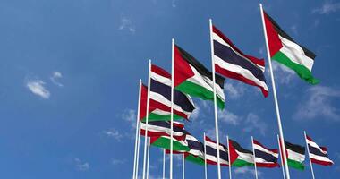 Thailand and Palestine Flags Waving Together in the Sky, Seamless Loop in Wind, Space on Left Side for Design or Information, 3D Rendering video