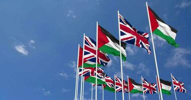 United Kingdom and Palestine Flags Waving Together in the Sky, Seamless Loop in Wind, Space on Left Side for Design or Information, 3D Rendering video