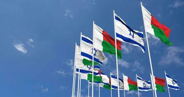 Madagascar and Israel Flags Waving Together in the Sky, Seamless Loop in Wind, Space on Left Side for Design or Information, 3D Rendering video