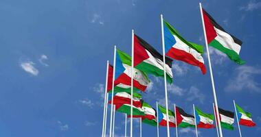 Equatorial Guinea and Palestine Flags Waving Together in the Sky, Seamless Loop in Wind, Space on Left Side for Design or Information, 3D Rendering video