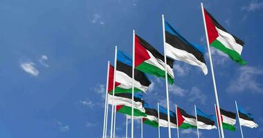 Estonia and Palestine Flags Waving Together in the Sky, Seamless Loop in Wind, Space on Left Side for Design or Information, 3D Rendering video