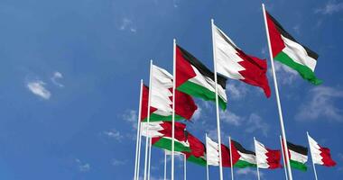 Bahrain and Palestine Flags Waving Together in the Sky, Seamless Loop in Wind, Space on Left Side for Design or Information, 3D Rendering video