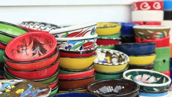 Collection of empty colorful decorative ceramic bowls video