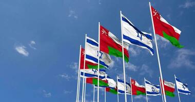 Oman en Israël vlaggen golvend samen in de lucht, naadloos lus in wind, ruimte Aan links kant voor ontwerp of informatie, 3d renderen video