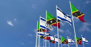 Saint Kitts and Nevis and Israel Flags Waving Together in the Sky, Seamless Loop in Wind, Space on Left Side for Design or Information, 3D Rendering video