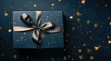 AI generated a blue gift box with gold stars on a dark background photo