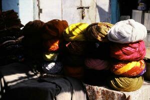 Brightly colored turbans in a shop photo