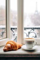 AI generated Cozy weekend vibes with steaming coffee, croissants, and a snowy window backdrop photo