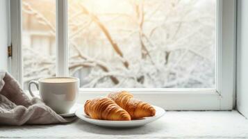 AI generated Cozy weekend vibes with steaming coffee, croissants, and a snowy window backdrop photo
