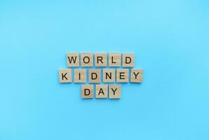 On March 9, World Kidney Day, a minimalistic banner with an inscription in wooden letters photo