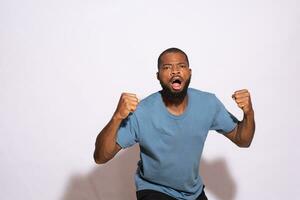 portrait of a young black man celebrating photo