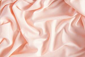 Luxurious satin textiles in peach color. Soft abstract waves of factory fabric. Festive background. Trend Colors of the Year 2024 Peach Fuzz. photo