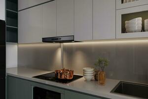 Cookers on the electric stove, ceramic bowl, and plants into a pot on the kitchen island. photo