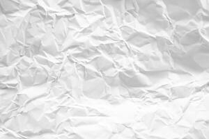 white and gray crumpled paper texture background. crush paper so that it becomes creased and wrinkled. photo