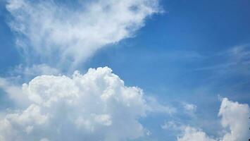 blue sky with cloud closeup. Sky background with clouds and sun photo