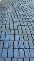 paving slabs in the street, closeup of photo. photo