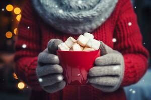 AI generated A man in a red knitted sweater, gloves and scarf holds a mug with a hot drink and marshmallows photo