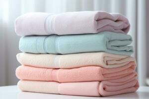 AI generated Stack of folded clean soft pastel colored towels. Generative AI photo